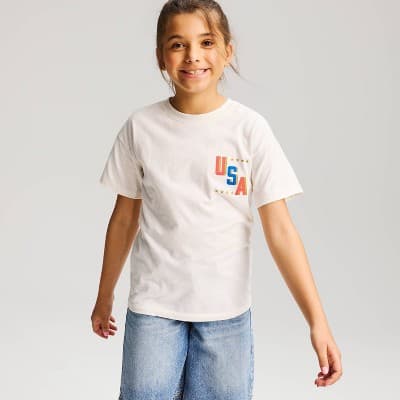 Girls' 4th of July Oversized Short Sleeve 'USA' Graphic Jersey T-Shirt - Cat & Jack™ Cream XS