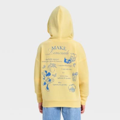 Girls' Disney Minnie Mouse and Figaro Lemonade Front and Back Graphic Hoodie Pullover Sweatshirt - Light Yellow S
