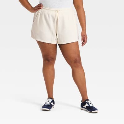Women's Mid-Rise Fleece Cozy Pull-On Shorts - Universal Thread™ Cream 1X